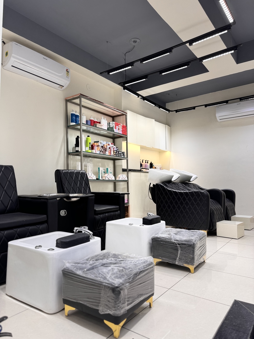 Pedicure and spa seating area at Lushé Salon