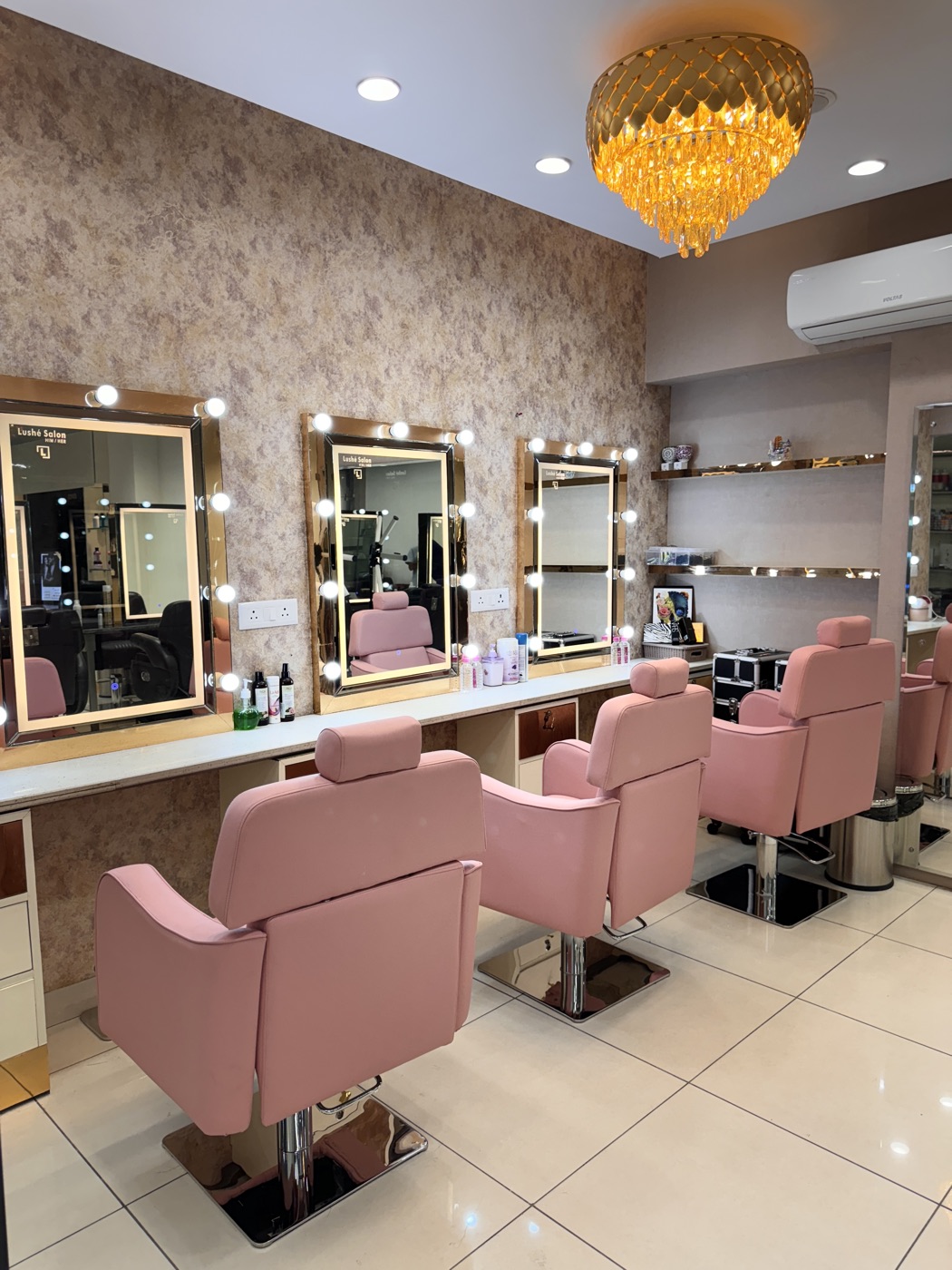Styling chairs and lit mirrors at Lushé Salon