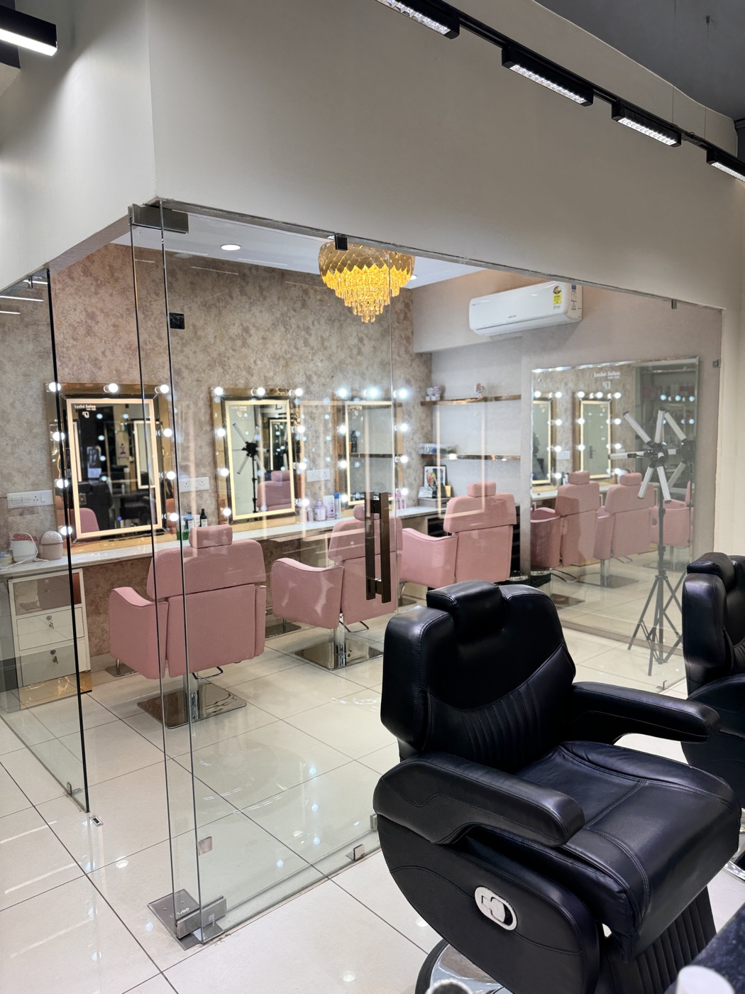 Styling area with chandelier at Lushé Salon