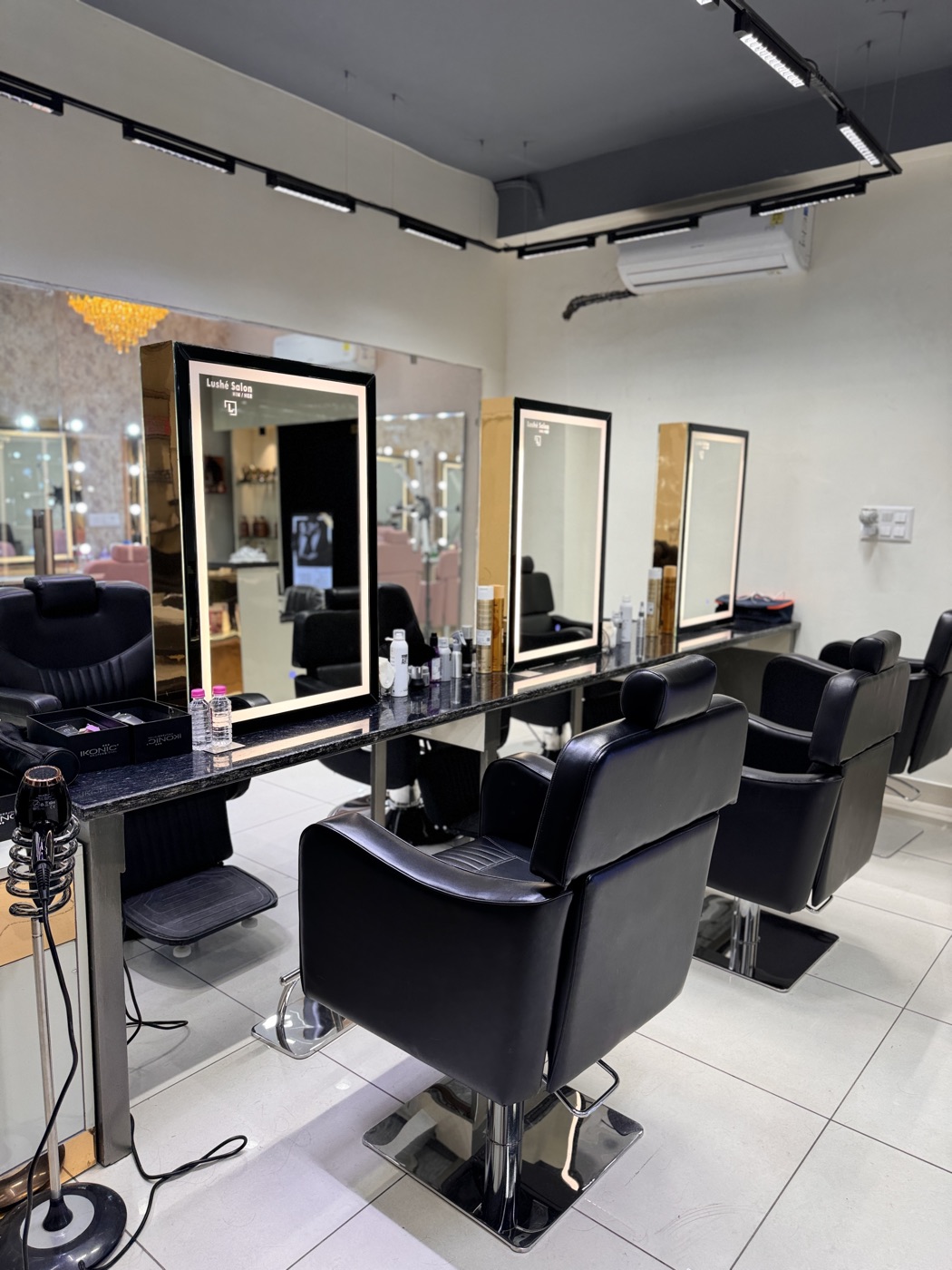 Hair styling stations at Lushé Salon