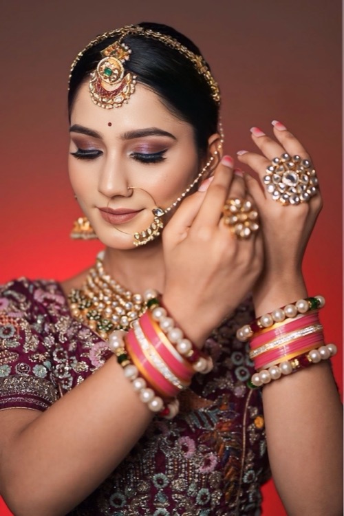 Bridal makeup and styling — detailed look at jewellery and makeup